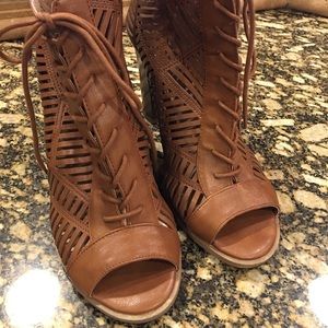 Tan lace up open toed booties